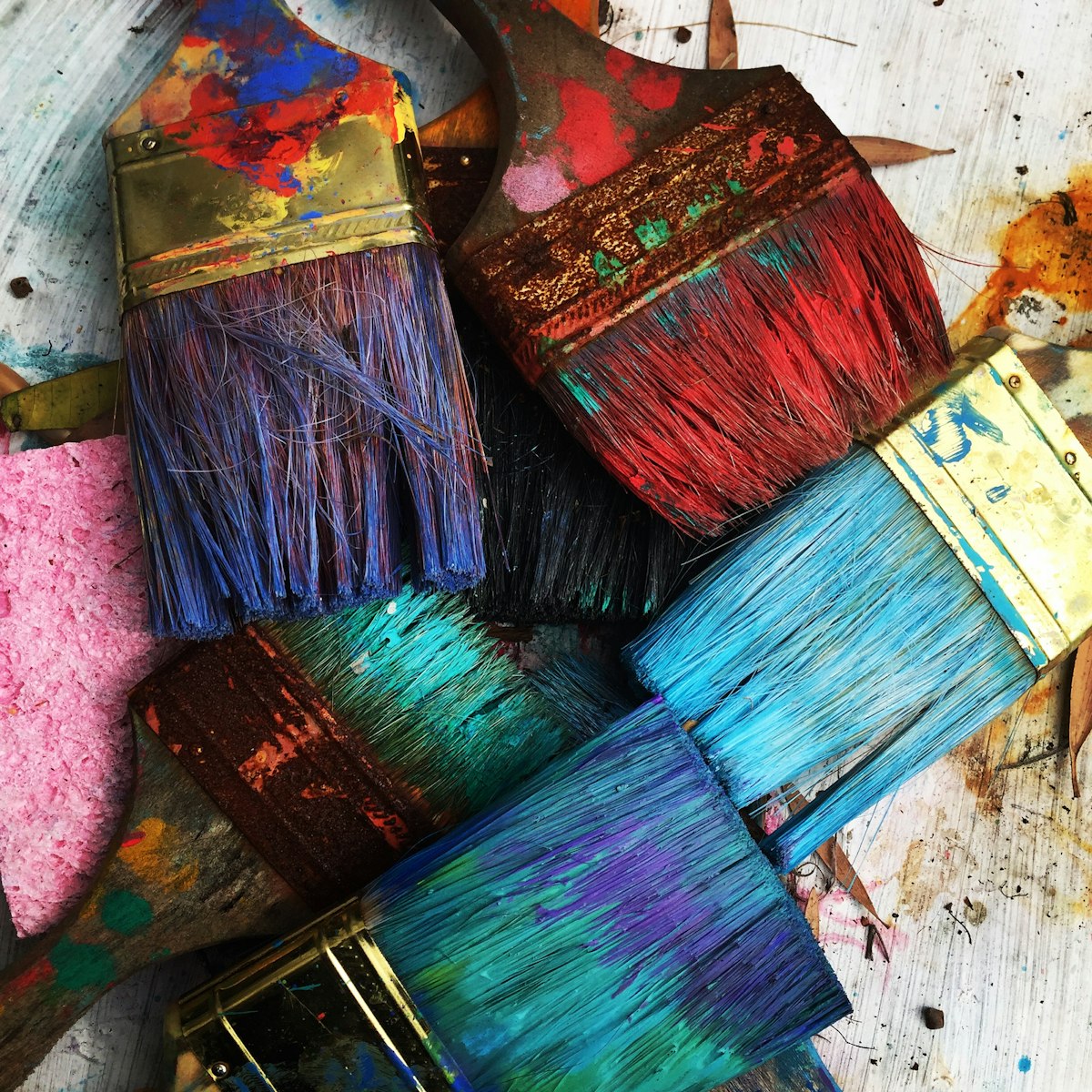 Artist hands with custom watercolor brushes